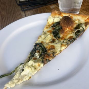Regents Pizzeria - Half a slice of white pizza - Pizza Near Me - San Diego, California