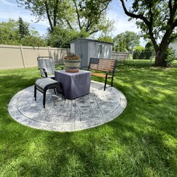 Olague Concrete Contractors - Small round pad, stamped concrete.