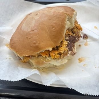 El Sabor Latino Bakery & Catering - Not sure what this sandwich was called but it packed a punch with a large amount of eggs, chorizo, and plantains. - Spanish Near Me - Wheaton, Maryland El Sabor Latino Bakery & Catering - Not sure what this sandwich was called but it packed a punch with a large amount of eggs, chorizo, and plantains. - Spanish Near Me - Wheaton, Maryland