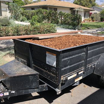 Sol Landscaping - a truck with a pile of mulch in the back - Landscaping Near Me Sol Landscaping - a truck with a pile of mulch in the back - Landscaping Near Me