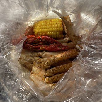Red Crab Juicy Seafood - Durham - Small order of snow crab legs (she grabbed a crawfish from my tray) - Cajun/Creole Near Me - Durham, North Carolina Red Crab Juicy Seafood - Durham - Small order of snow crab legs (she grabbed a crawfish from my tray) - Cajun/Creole Near Me - Durham, North Carolina
