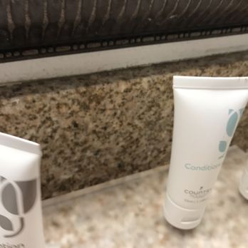 Country Inn & Suites - Dirty/used/ unchanged lotion, conditioner and shampoo bottles. - Hotels Near Me - Sumter, South Carolina