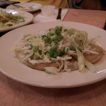 Dixie Kitchen and Bait Shop - Trust me under all that lettuce is a fine tasty sampling of fried green tomatos - Southern Near Me - Lansing, Illinois