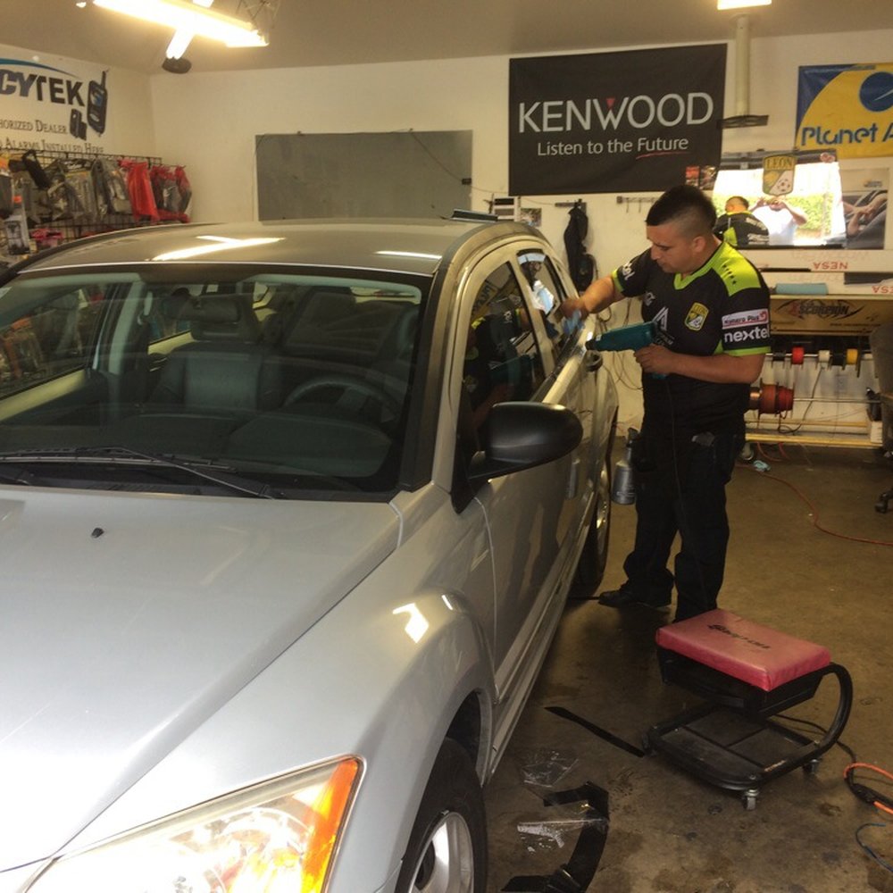 Luis owner of company putting in work on my car making it look nice