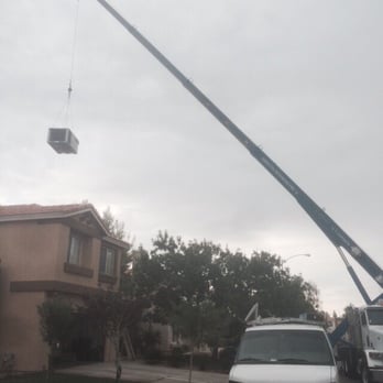 A-Tech Heating and Cooling - removing 20 year old AC - Heating & Air Conditioning/HVAC Near Me - Las Vegas, Nevada A-Tech Heating and Cooling - removing 20 year old AC - Heating & Air Conditioning/HVAC Near Me - Las Vegas, Nevada