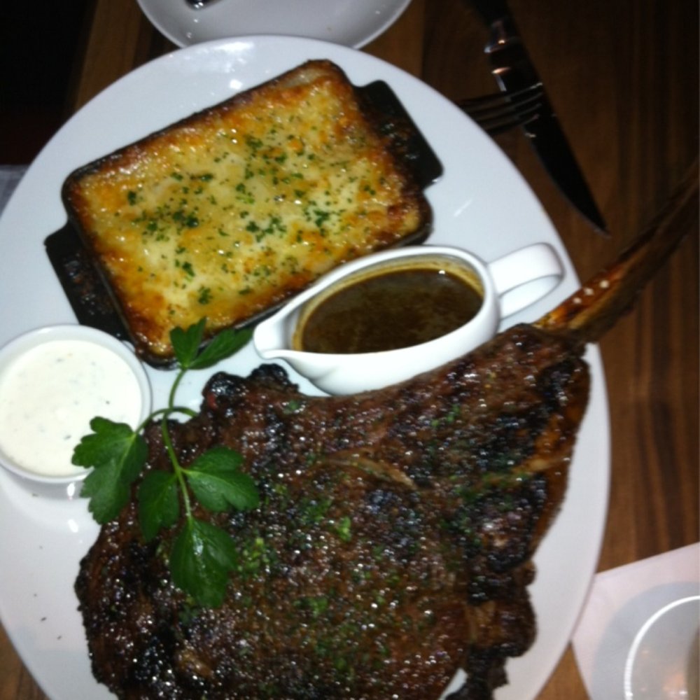 THE RANCH Saloon - The 36 oz. cowboy ribeye served with scalloped potatoes. Incredible!!! - Country Dance Halls Near Me - Anaheim, California