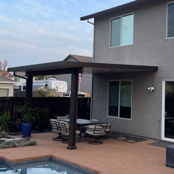 MasterMax Builders - Drain spout on corner, electrician wired the lighting - Patio Coverings Near Me - Rocklin, California