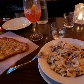 SWeL Restaurant - Hand tossed pizza with pears, gorgonzola and tagliatelle pasta with wild mushrooms and Italian sausage and herbs. Beautiful! - New American Near Me - Seattle, Washington SWeL Restaurant - Hand tossed pizza with pears, gorgonzola and tagliatelle pasta with wild mushrooms and Italian sausage and herbs. Beautiful! - New American Near Me - Seattle, Washington