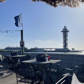 Rum Runners - Patio seatings with the view of lake Erie and the bicentennial tower - Bars Near Me - Erie, Pennsylvania Rum Runners - Patio seatings with the view of lake Erie and the bicentennial tower - Bars Near Me - Erie, Pennsylvania