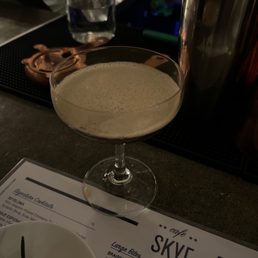 a cocktail in a coupe glass