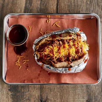 Bodacious Bar and Q - a hot dog with cheese and ketchup - Bars Near Me - Shreveport, Louisiana Bodacious Bar and Q - a hot dog with cheese and ketchup - Bars Near Me - Shreveport, Louisiana