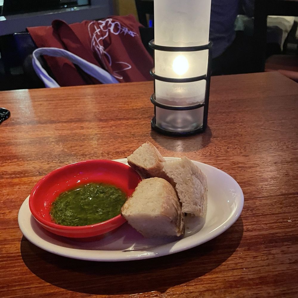 complimentary bread with an amazing green sauce complimentary bread with an amazing green sauce