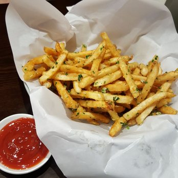 Pho Che - Awesome, crispy basket of fries with parsley, parmesan, and garlic (French Fries Provenzal) - Vietnamese Near Me - Flushing, New York