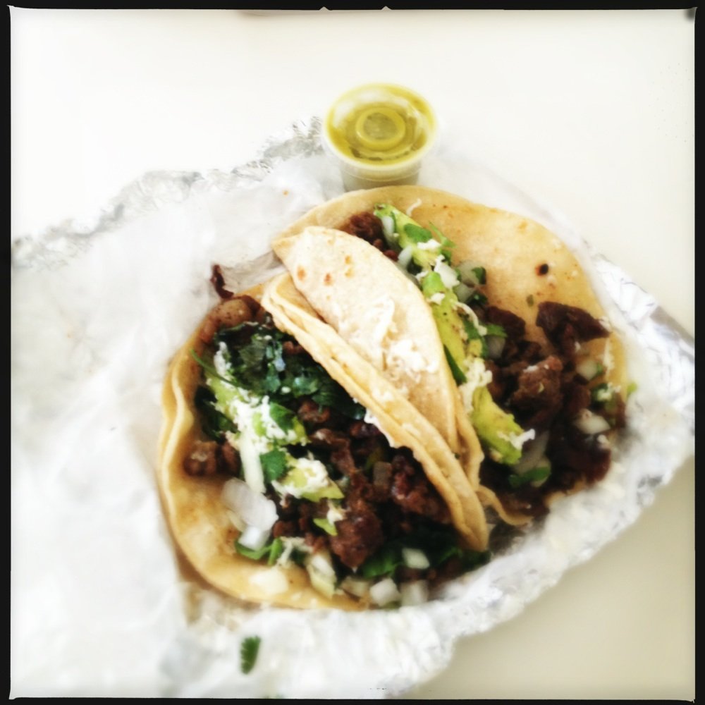 Con Madre Kitchen - Bistek tacos with cilantro, onions, queso fresco, lime and green salsa - Mexican Near Me - Austin, Texas