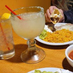 Mama Maria's Grill - Margarita drinks, rice, beans, guacamole, and sour cream.  Chips and salsa at Mama Maria's.