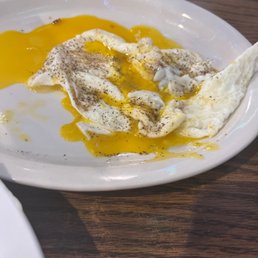 Undercooked over medium eggs