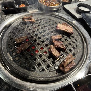 Steak N’ Bone - Grilling the meat - Korean Near Me - Baltimore, Maryland