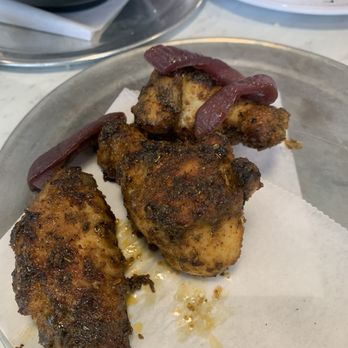 V Pizza - Wings (we already ate two!) - Pizza Near Me - Orlando, Florida