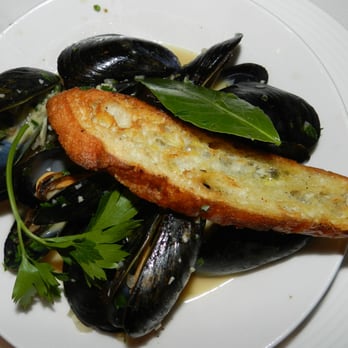 RIS - Moules Marinière with butter, herbs and vermouth, served with grilled bread - New American Near Me - Washington, DC, District of Columbia RIS - Moules Marinière with butter, herbs and vermouth, served with grilled bread - New American Near Me - Washington, DC, District of Columbia