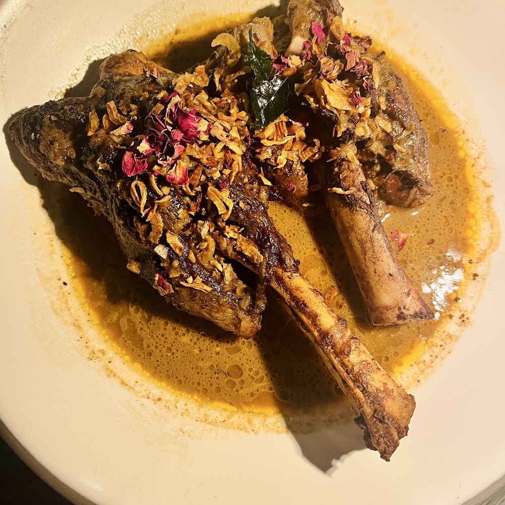 Peregrine - Milk braised lamb shank - American Near Me - Raleigh, North Carolina Peregrine - Milk braised lamb shank - American Near Me - Raleigh, North Carolina
