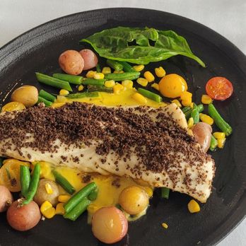 Jula’s on the Potomac - Beautiful Branzino in a summer themed context. Amazing! - Breakfast & Brunch Near Me - Alexandria, Virginia Jula’s on the Potomac - Beautiful Branzino in a summer themed context. Amazing! - Breakfast & Brunch Near Me - Alexandria, Virginia