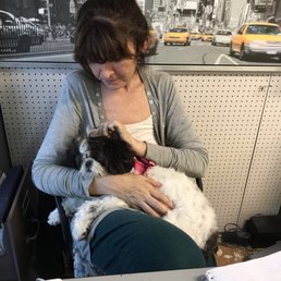 Florina, owner, pet lover, she's amazing with our furry friends!!! There's not one that she doesn't love.