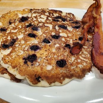 Eggs Up Grill - Sour tasting gluten-free pancakes with blueberries and no powdered sugar. - Breakfast & Brunch Near Me - Columbia, South Carolina Eggs Up Grill - Sour tasting gluten-free pancakes with blueberries and no powdered sugar. - Breakfast & Brunch Near Me - Columbia, South Carolina