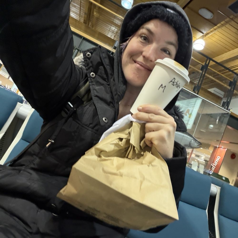 Happy customer waiting for next plane with good food and delicious coffee!!! Happy customer waiting for next plane with good food and delicious coffee!!!