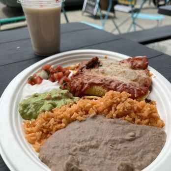 Mexicana - Enchilada platter served with rice and refried pinto beans. The enchiladas were filled with the al-pastor beef spiced just right. - Mexican Near Me - Berkeley, California