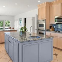 Tradesman Painting & Drywall - Kitchen island cabinets:
Strip, sand prime and paint job turned out beautiful.
#Tradesman Painting 415 504 4968