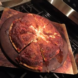 Cal's Party Store - May have Cooked it too long but there was TONS of cheese. Cal's frozen pizzas!!