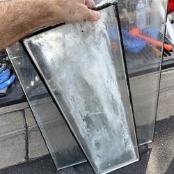 Major League Glass and Mirrors - Moisture in the dual pane unit. This is a simple fix.