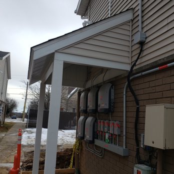 NapperCraft Home Improvement - a house with electrical equipment on the side of the house - Handyman Near Me NapperCraft Home Improvement - a house with electrical equipment on the side of the house - Handyman Near Me