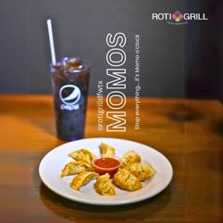 Roti Grill - Soft & Delicious Momos at Roti Grill!
Treat yourself to freshly prepared dumplings, stuffed with your choice of flavorful chicken or veg.