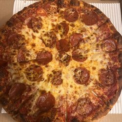 Faro's Italian Pizza - My sons. Pepperoni.  Don't worry! some peps are buried under the cheese.   Made with American love imo.
