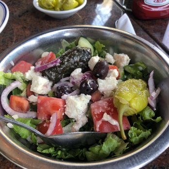 Lefteris Gyro - Greek Salad (small salad in metal bowl with feta, olives, romaine lettuce, tomato chunks, onions) - Greek Near Me - Tarrytown, New York Lefteris Gyro - Greek Salad (small salad in metal bowl with feta, olives, romaine lettuce, tomato chunks, onions) - Greek Near Me - Tarrytown, New York