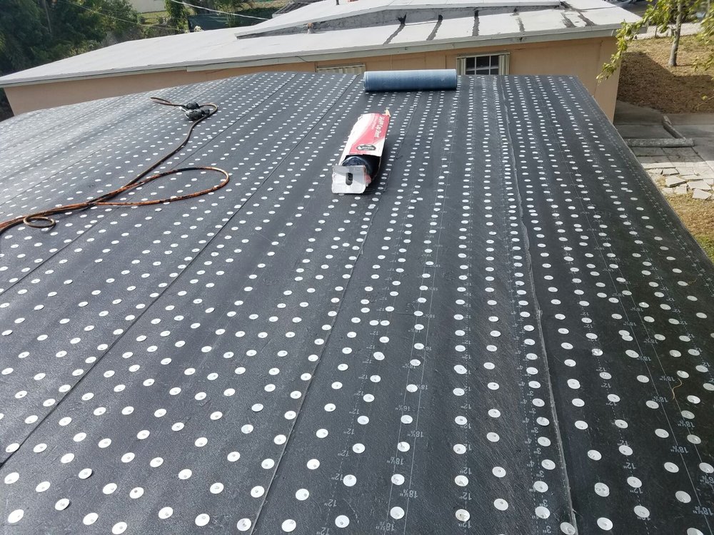 Slide of Solis Roofing Contractors