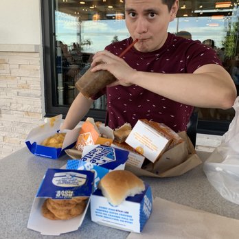 White Castle - My friend eating White Castle. - Burgers Near Me - Orlando, Florida White Castle - My friend eating White Castle. - Burgers Near Me - Orlando, Florida