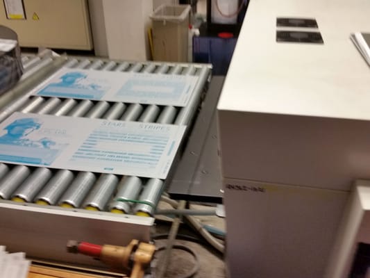 Photo of Tampa Bay Times - Saint Petersburg, FL, US. After the excess coating is washed off, you can see the editorial content, photos, and ads on the metal plates