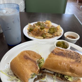 Puerto Nuevo Coffee - Carnitas Torta with chips,beans,cheese & salsa and a Horchata - Mexican Near Me - Los Angeles, California Puerto Nuevo Coffee - Carnitas Torta with chips,beans,cheese & salsa and a Horchata - Mexican Near Me - Los Angeles, California