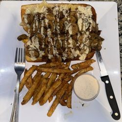 Sam's Grill & Bar - Philly with fried jalapeños and Cajun garlic parm fries