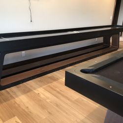 Shuffleboard we installed with matching pooltable next to it. Made out of carbon fiber