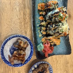Sakura - volcano maki roll and complimentary fried fish skins