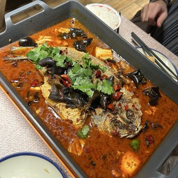 Rong Chic - grilled fish entree served family style. we added wood ear mushrooms, but the broth comes with napa cabbage. - Chinese Near Me - Providence, Rhode Island