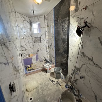 Ray's Straight Line Painting - Guest bathroom remodel, Big tile converted bathtub into shower with seat and rain showerhead. - Painters Near Me Ray's Straight Line Painting - Guest bathroom remodel, Big tile converted bathtub into shower with seat and rain showerhead. - Painters Near Me