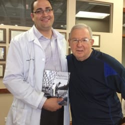Ankle N Foot Centers - Dr Rivera with a famous author