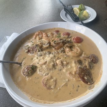 Cazzy's Corner Grill - Creamy shrimp and grits with mushroom, sausage, red onion and tomatoes. - American Near Me - Knoxville, Tennessee