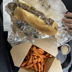 Big AL’s Cheesesteaks - Big Al's cheesesteak and a side of sweet potato fries with a side of cinnamon butter