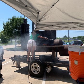 Caliente Harley-Davidson - Lupe making bbq, who says it's a mans job! Great bbq and she makes it look good. - Motorcycle Dealers Near Me - San Antonio, Texas