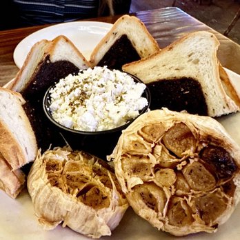 St. Pete's Dancing Marlin - Mama's Baked Garlic - American Near Me - Dallas, Texas